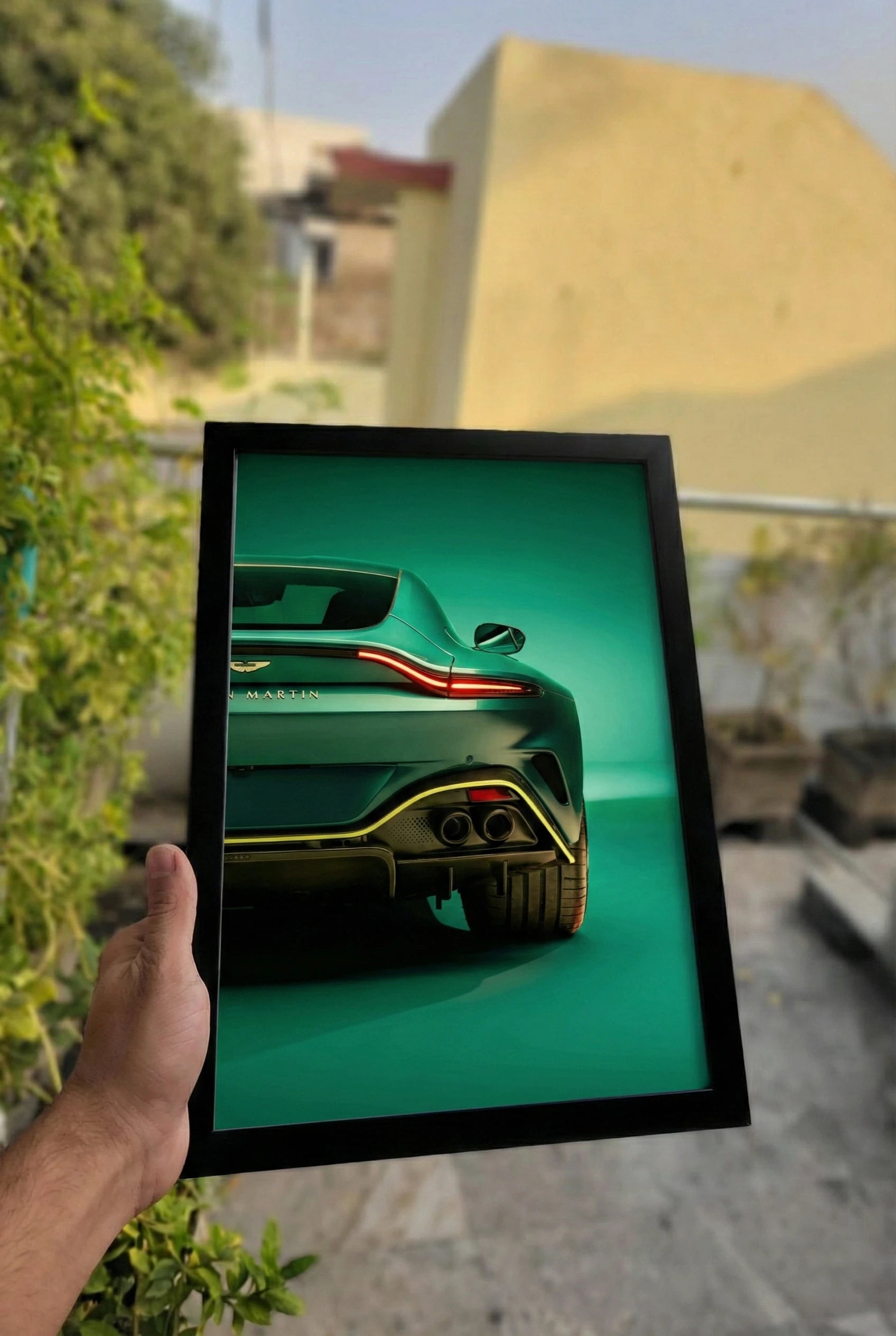 Supercar Framed Poster held by hand | Luxury Wall Art